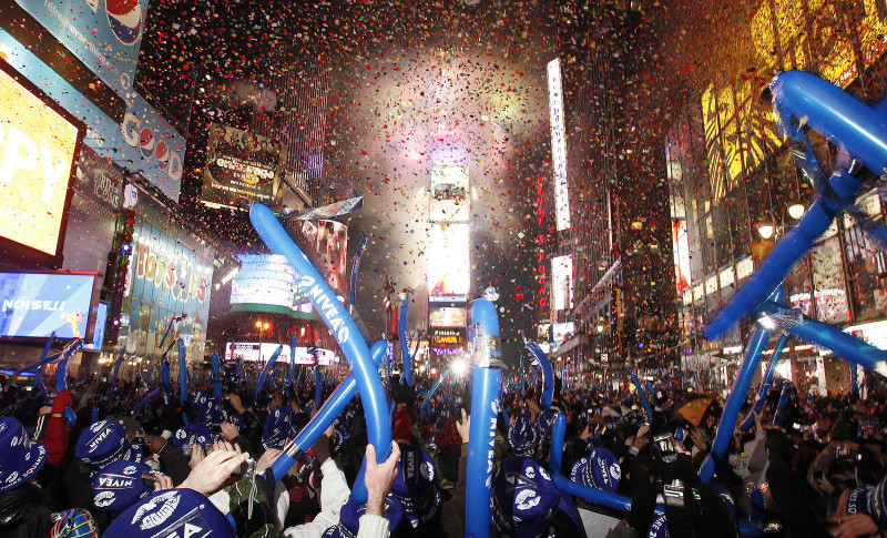 01 Jan 2010, NEW YORK, NY, United States --- Revelers take part in New Year celebrations in New York --- Image by © LUCAS JACKSON/Reuters/Corbis